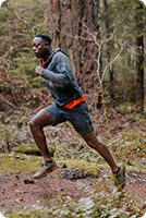 Person hiking wearing Merrell shoes.