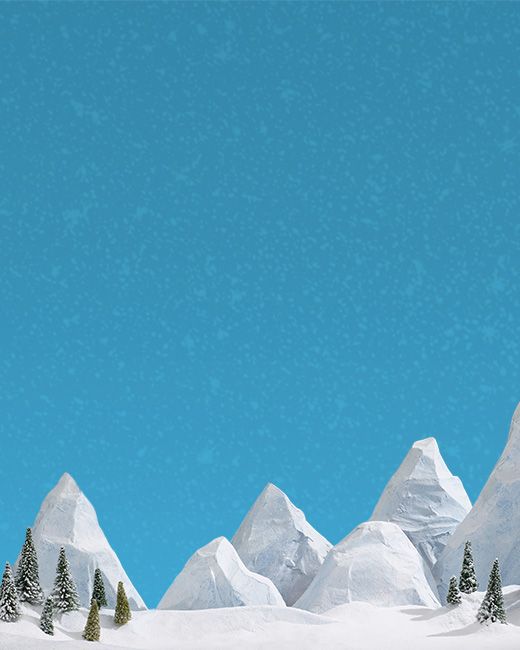 A group of trees and mountains.