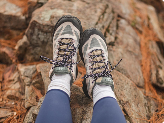 Legs in Merrell gear.