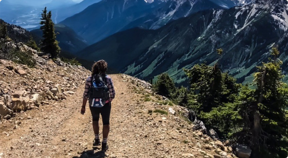 Dionne Daley hiking in Merrell gear.