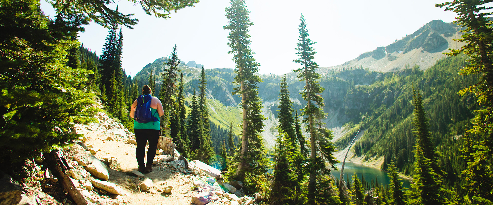 Kaila Walton in the wood with a backpack.