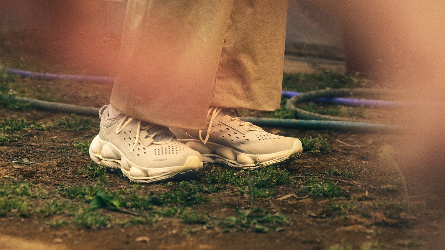 Merrell shoes standing on a grassy trail