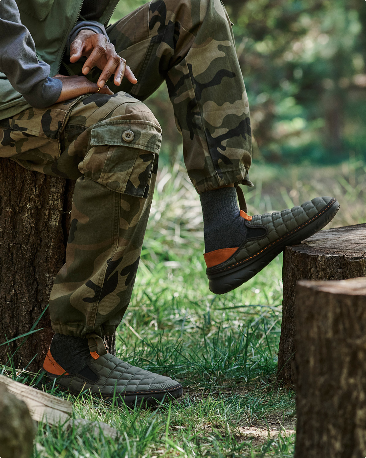 Someone in Merrell Hut Moc Shoes.