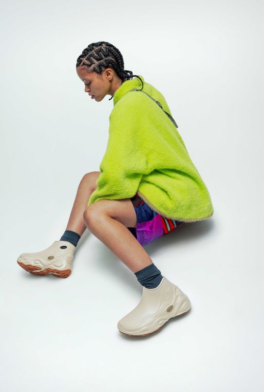 a person's legs and shoes