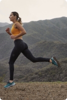 Person hiking wearing Merrell shoes.