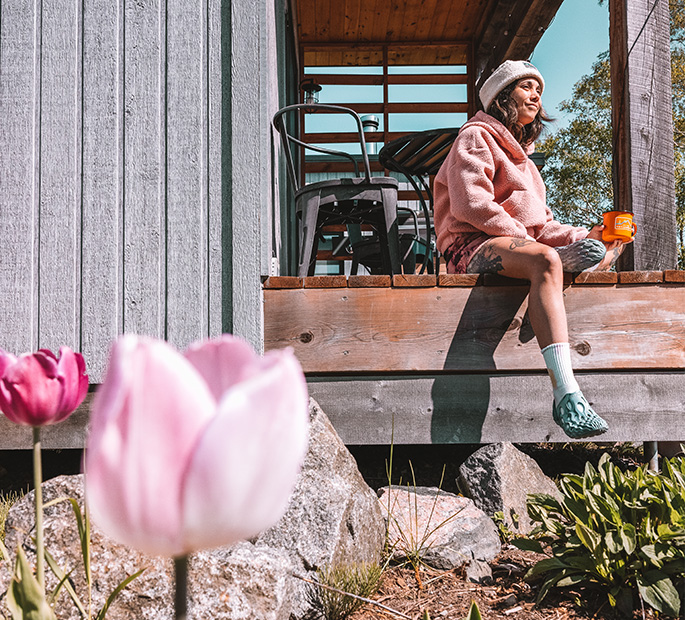 Johany Sergerie sitting on a porch.