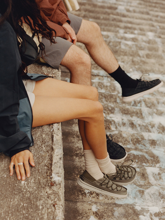 Someone wearing Merrell shoes.