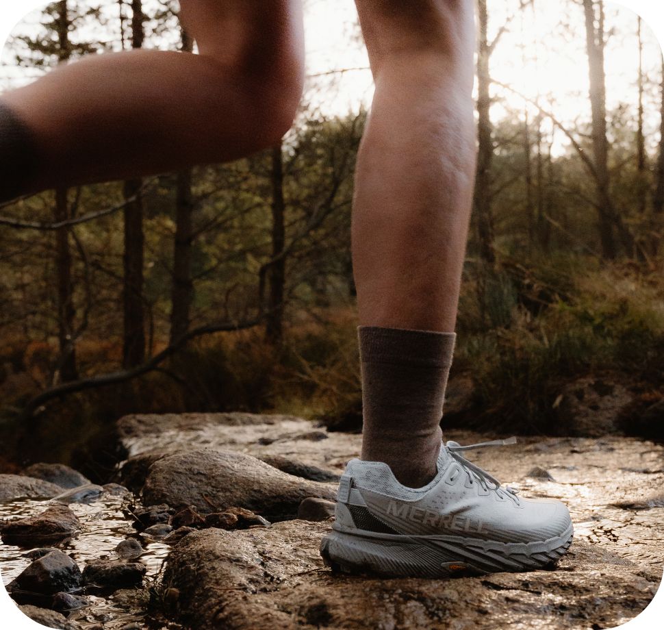 Different shots of people wearing Merrell Agility Peak 5