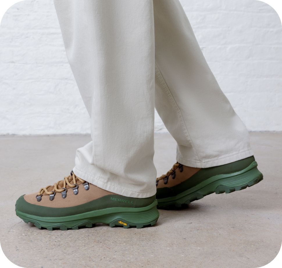 Model close up in green soled shoes
