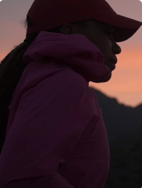 Silhouette against a mountain background