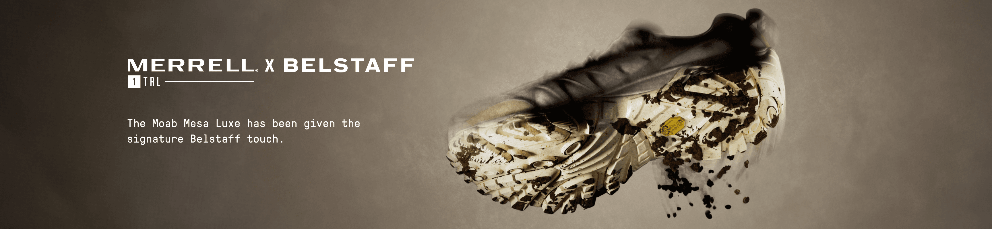 Belstaff shoe with dirt falling off the bottom on a brown background
