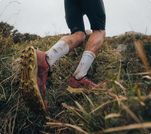 People running wearing Merrell ProMorph shoes