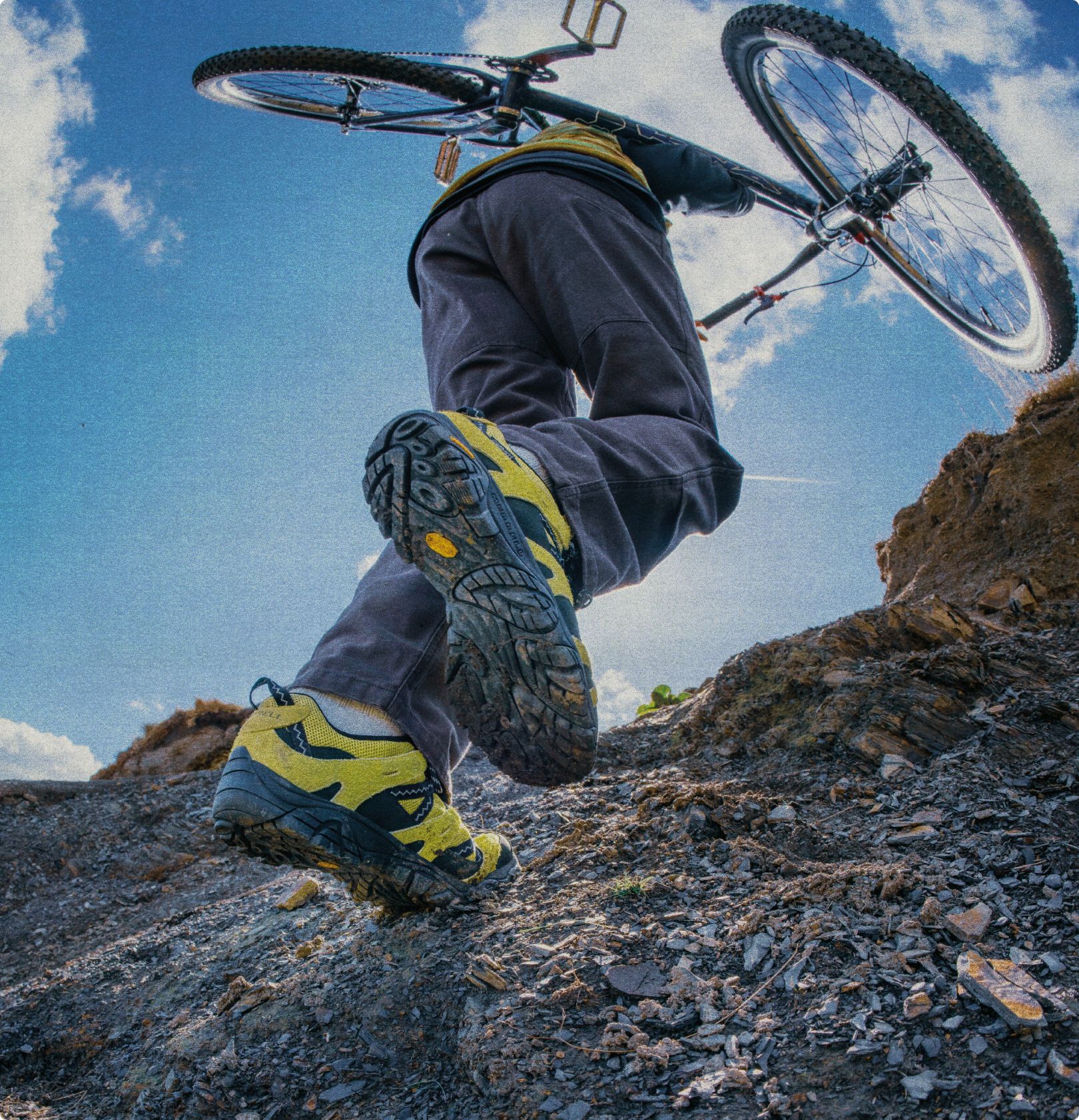 A chameleon matching the color of colorful Merrell Dime hiking boots