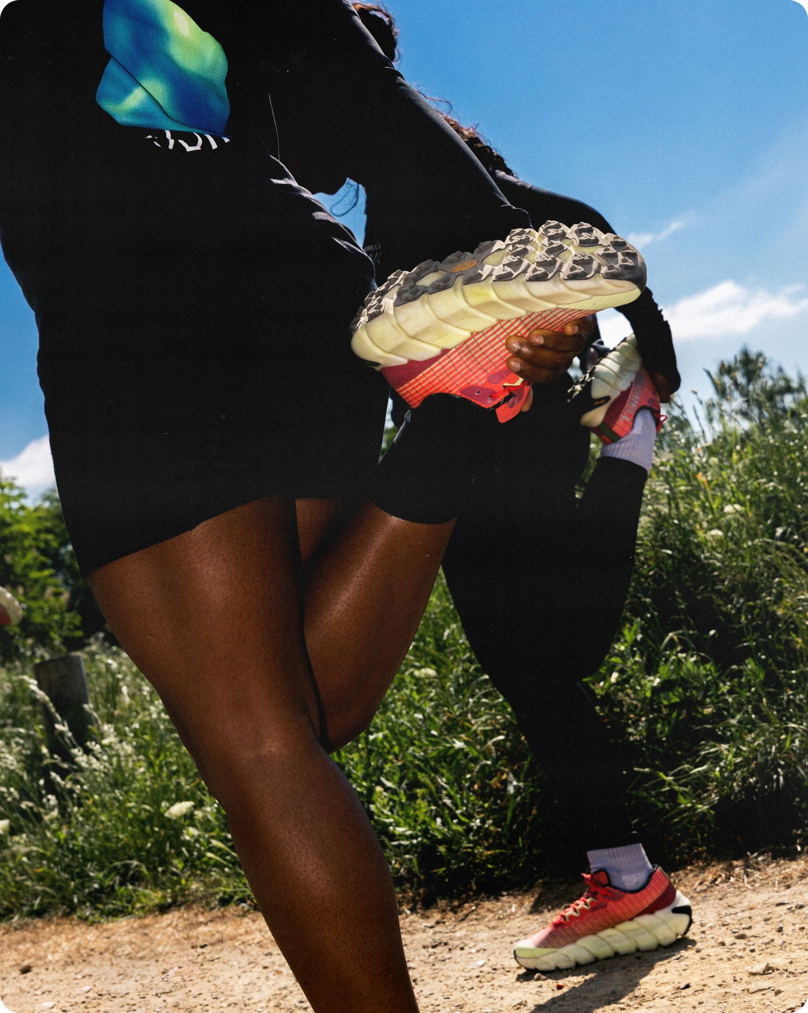 a person wearing Merrell shoes