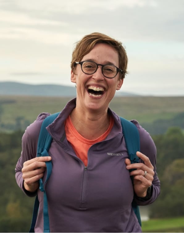 Girl hiker wearing Merrell Jacket