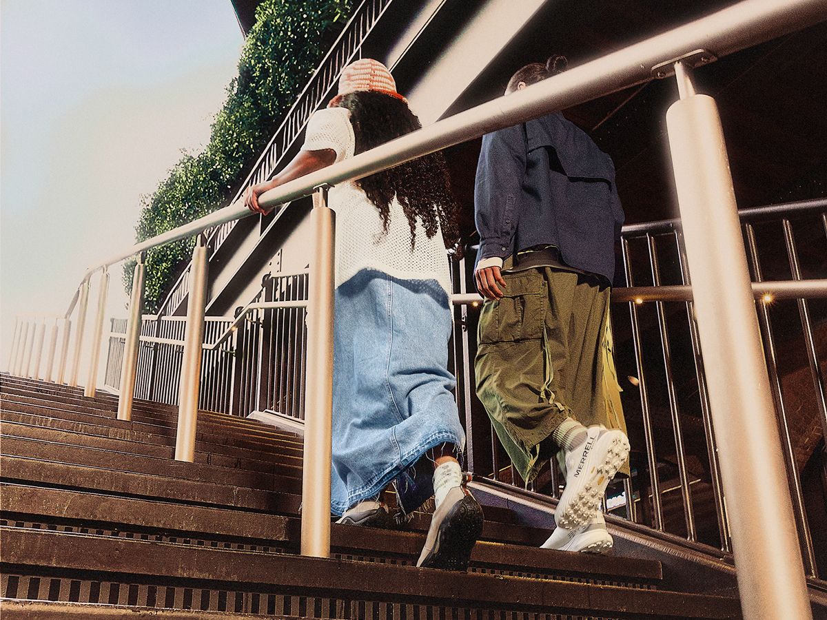 People walking up stairs in Merrell Jungle Moc shoes
