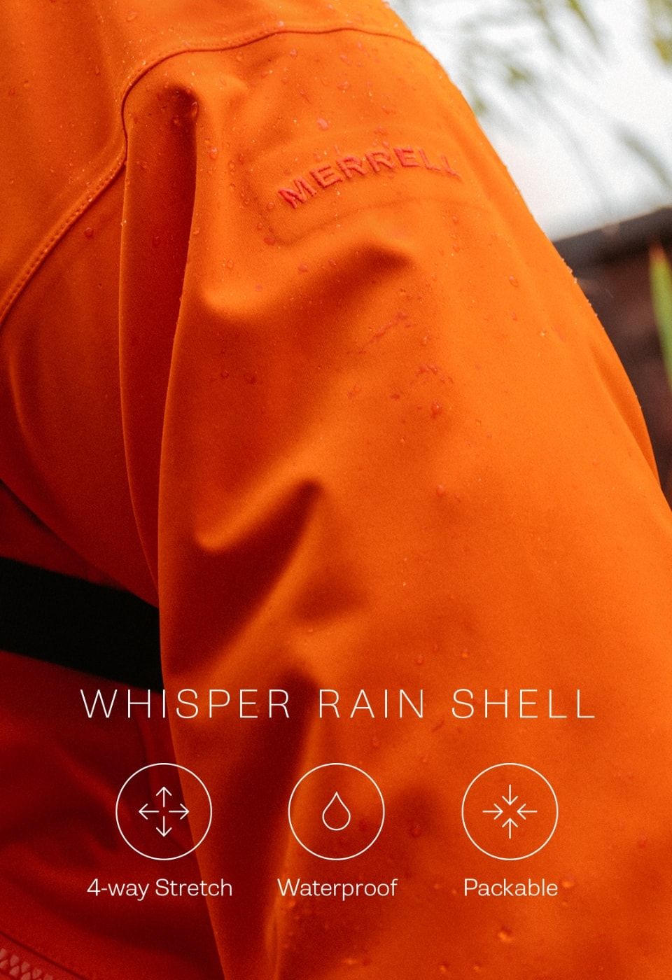 Person hiking in the whisper rain jacket.