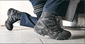 Close up of Merrell black tactical boots.