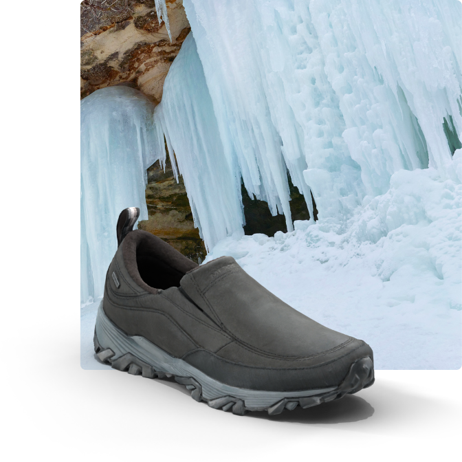 Moc beside a frozen waterfall.