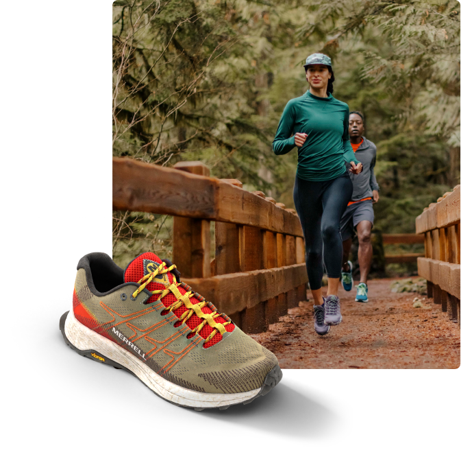 All the layers of the Antora 2 shoe next to a person running in the woods wearing the the shoes.