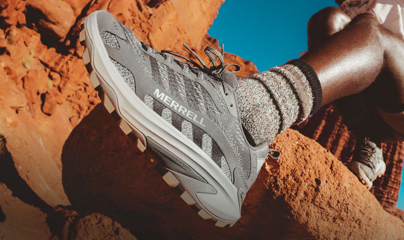 People outside wearing merrell footwear