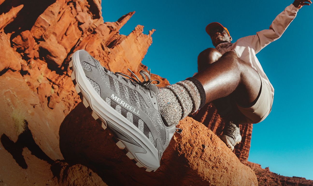 People outside wearing merrell footwear