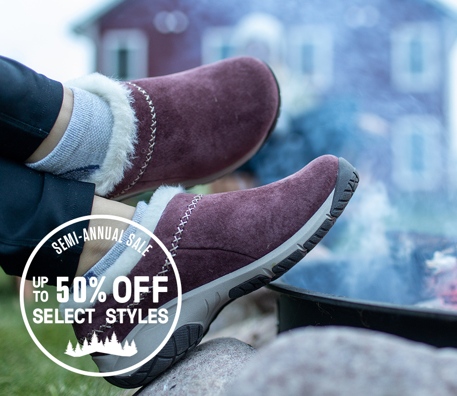 Merrell slip-ons next to a nice campfire.