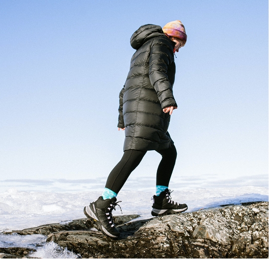 Woman hiking in the snow