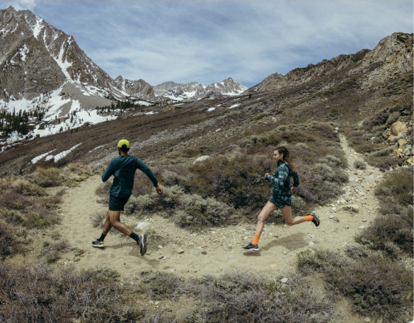 People running a hiking trail.