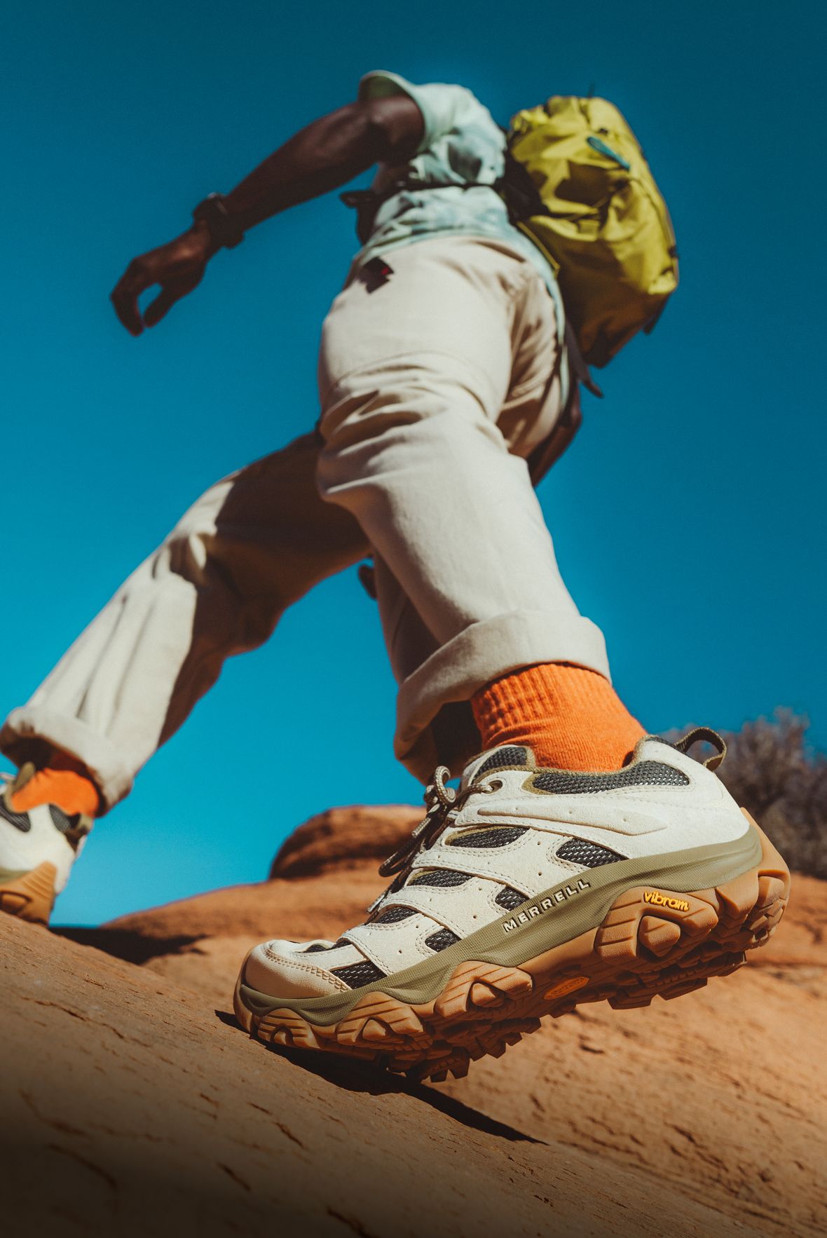 Man hiking wearing Merrell hiking boots