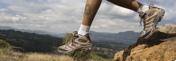 Person hiking on rocky terrain in moab 3s.