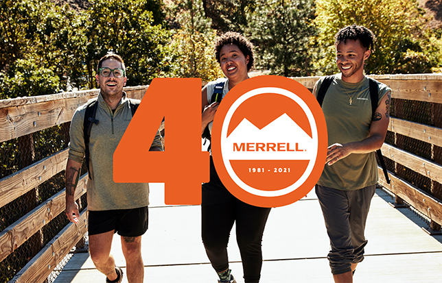 Logo for Merrell 40 years 1981-2021 floating in front of young happy people walking on a bridge.