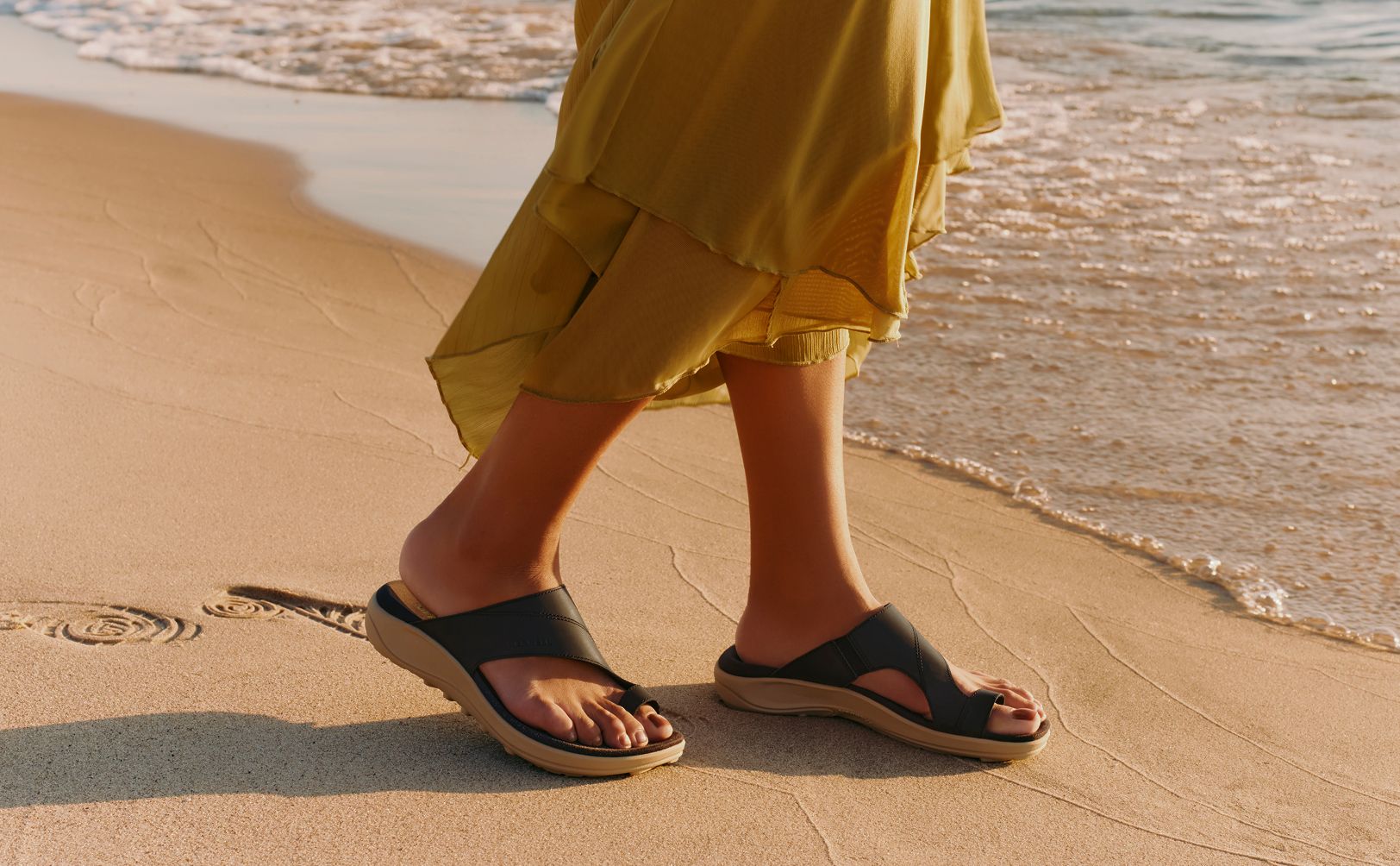 A woman wearing Merrell sandals