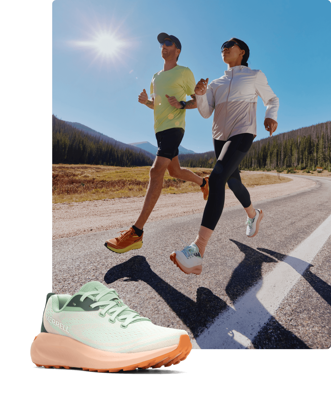 Two people running on a paved trail.