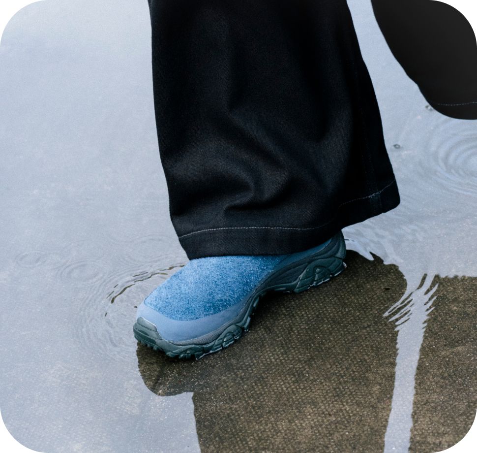 Person wearing the Moab 2 Slides.
