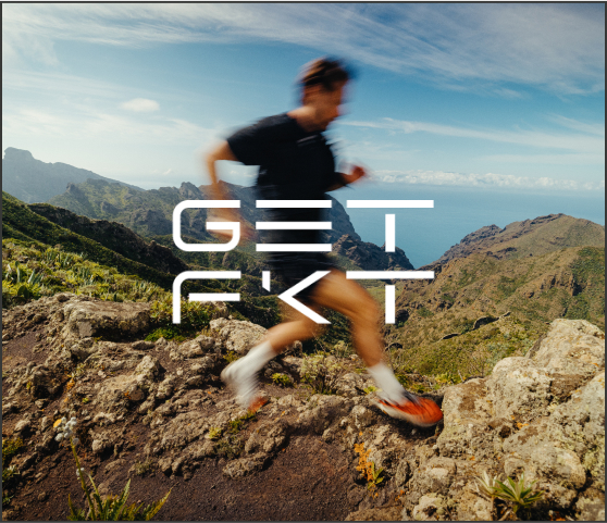Blurred image of a person running in the mountains.