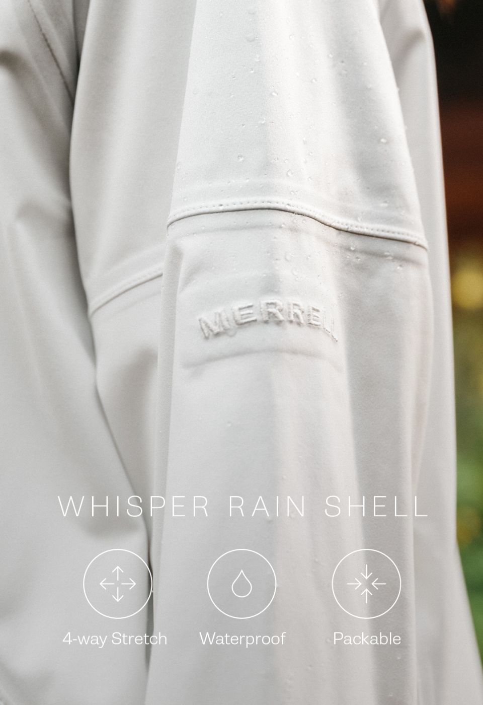 Person hiking in the whisper rain jacket.