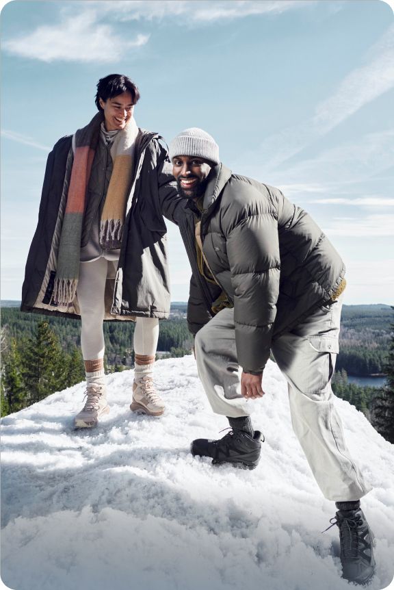 Man in woods wearing Merrell hiking boots