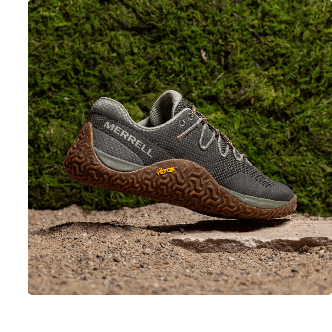 Trail glove floating over dirt.