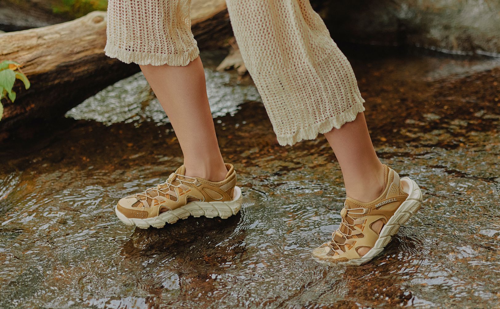 A woman wearing sandals.