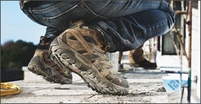 Close up of Merrell brown work boots.