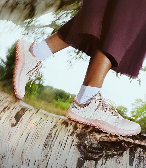 Person walking in barefoot shoes outside